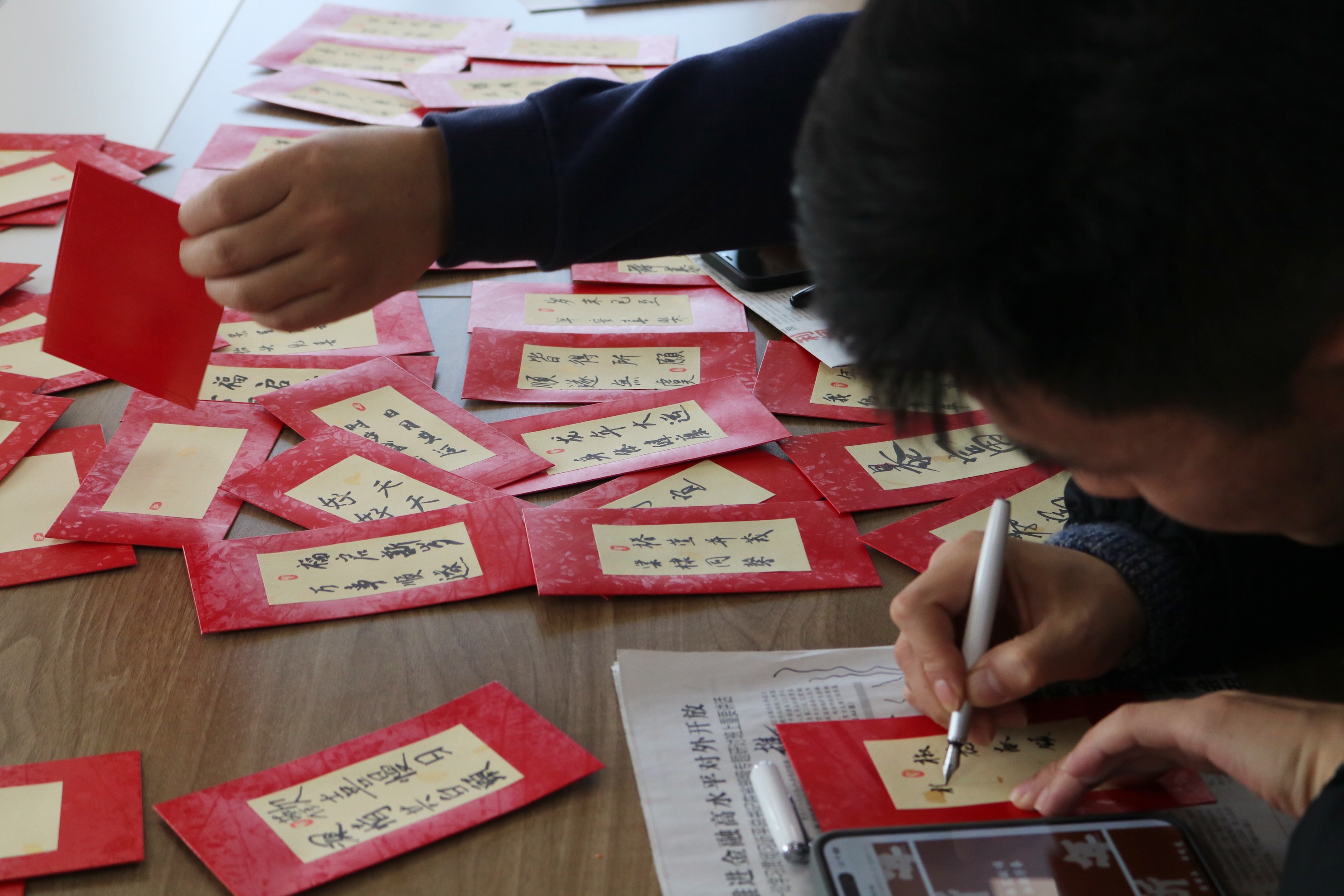 龙行龘龘谱新章 yl6809永利集团工会开展祝语迎新春誊写活动